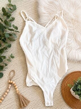 Forever 21 white strappy  bodysuit size small
